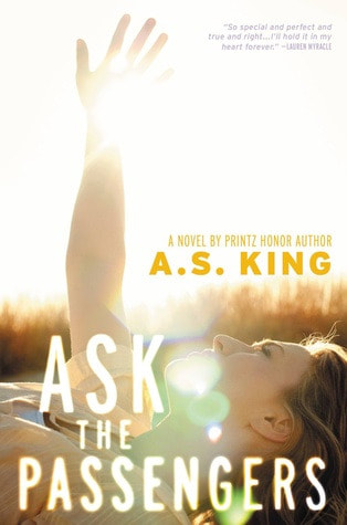 Book cover for Ask the Passengers by A. S. King showing teen girl with hand raised toward the sun